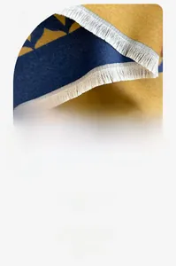 Detail of premium wool scarf fringe with blue and yellow geometric patterns