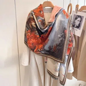Detail view of winter scarf with oil painting landscape and Hand Made label fringe