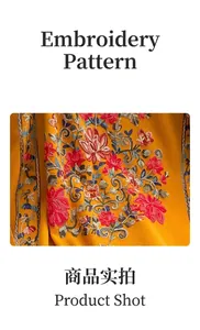 Close-up of vibrant floral embroidery on a yellow cashmere-like autumn winter shawl