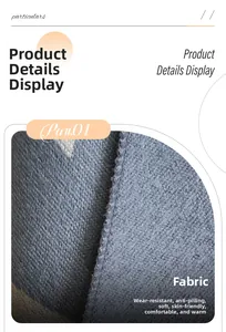 Close-up of soft blue floral cashmere-like scarf fabric showing thick woven texture