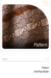 Détail macro du motif éléphant et de la texture en damier sur l'écharpe chaude