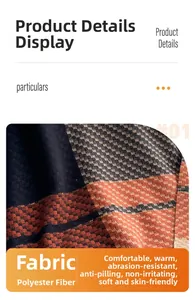 Detail of checkered cashmere-feel scarf fabric in black and orange showing soft texture
