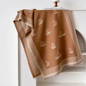 Classic double-sided caramel cashmere shawl with sailboat pattern and fringe trim