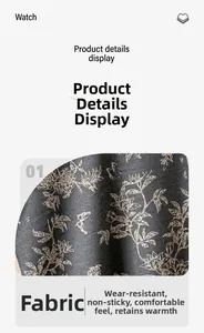 Detail of gray cashmere-like scarf showing floral pattern with anti-pilling warm texture