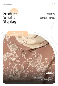 Close-up of floral cashmere scarf showing soft texture and anti-pilling fabric detail