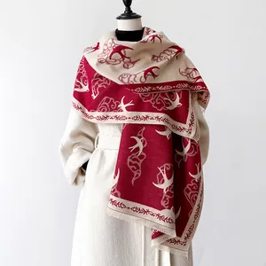 Winter faux cashmere scarf with swallow and cloud print in burgundy and cream
