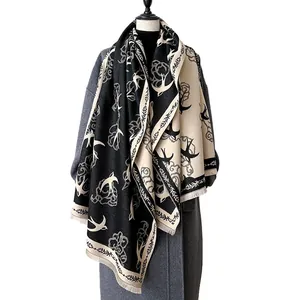 Elegant 2024 cashmere-like shawl with swallow cloud prints and fringe details