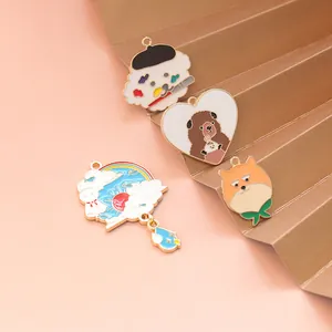 Lot de breloques en émail cartoon avec motifs chien et ours et bords en alliage doré