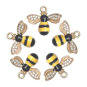 Set van 5 vergulde bijenhangers met geel emaille en fonkelende steentjes voor sieraden