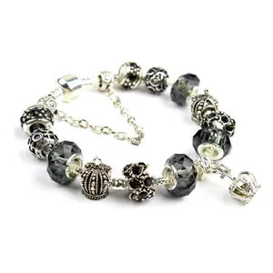 Bohemian silver snake chain bracelet with vintage crown charms and black glass beads