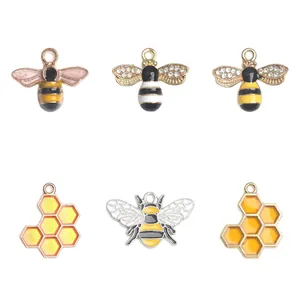 Set van zes bijen- en honingraatbedels voor DIY-sieraden maken van gepolijst metaal