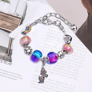 Colorful unicorn charm bracelet with rainbow pendants and adjustable silver chain