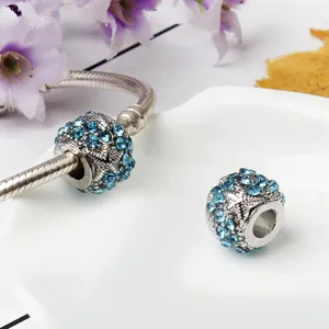 DIY silver snake chain bracelet featuring light blue crystal starfish star sea beads charm