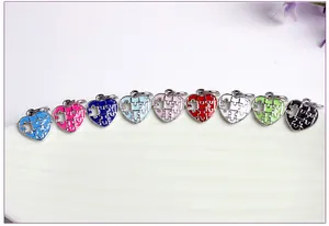 Colorful enamel heart puzzle charms in nine vibrant shades for DIY jewelry making