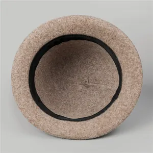 Detail view of wool felt hat interior showing stitching and black inner sweatband