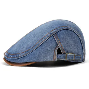 Retro denim wash beret hat with brown leather brim and contrast orange stitching details