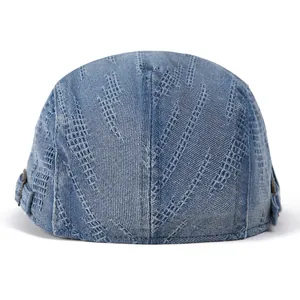 Vintage blue denim flat top hat featuring unique geometric textured patterns and side metal buttons
