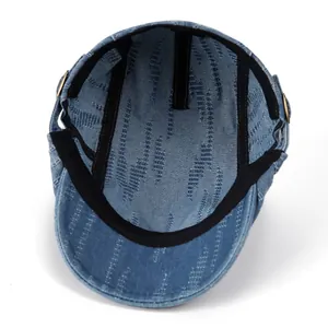 Vintage light blue denim flat cap with internal sweatband and high-quality stitching