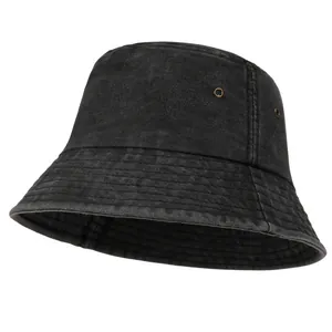 Detail of vintage black washed denim bucket hat showing side metal eyelets and stitching