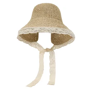 Women's summer straw hat with lace edge and chin strap for beach sun protection