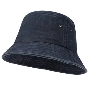 Detail view of washed denim bucket hat showing metal ventilation eyelets and stitching