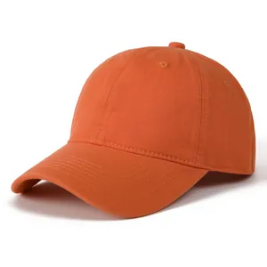 Detail of premium orange cotton twill baseball cap with reinforced stitching and eyelets