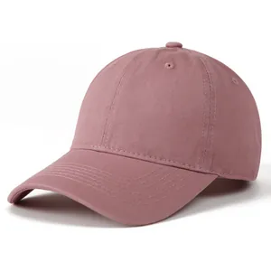 Detail of dusty pink cotton baseball cap crown with embroidered eyelets and button
