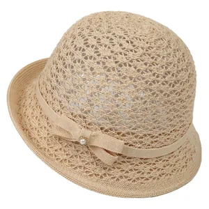 Chic woven straw sun hat for women with bowknot and pearl detail for summer