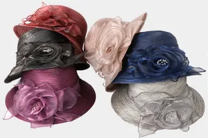 Detail of six colorful organza sun hats with floral ornaments and pearl accents