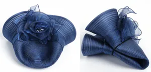 Detail of navy blue organza sun hat featuring a large 3D flower with bead accents