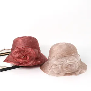 Elegant organza sun hats with large floral decoration in red and champagne colors