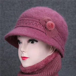 Purple knit winter hat and scarf set for elderly women with floral accent and warm lining