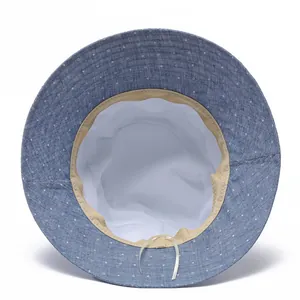 Close-up of the interior structure and white lining of a polka dot cotton sun hat