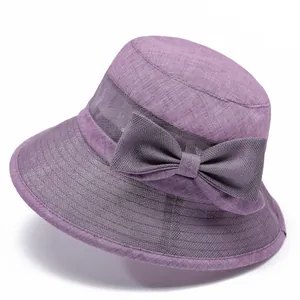 Women's breathable purple sun hat with mesh stitching and decorative bow for summer sun protection