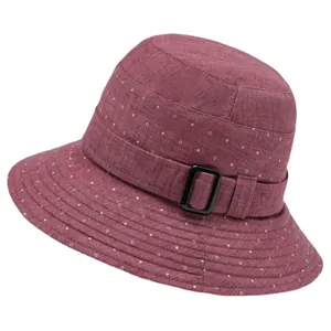 Vintage pink cotton sun hat for elderly women featuring white polka dots and buckle trim
