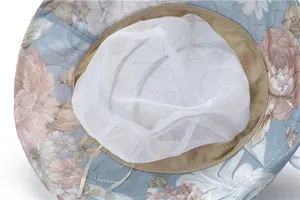 Close-up of breathable mesh lining and adjustable drawstring on floral sun hat