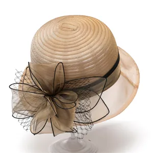 Elegant gold-brown French organza sun hat with oversized black mesh bow decoration