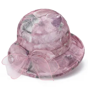 Elegant floral mesh sun hat for women featuring a large bow and breathable wide brim