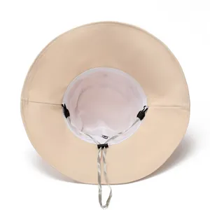 Detail of wide brim sun hat with breathable mesh lining and adjustable chin strap