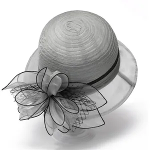 Detailed view of grey organza sun hat with oversized decorative floral mesh and ribbon