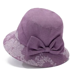 Elegant purple cotton linen sun hat for elderly women with floral lace and bow detail