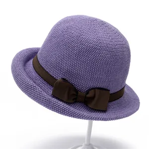 Elegant purple knitted sun hat for elderly women with brown ribbon and bow accent