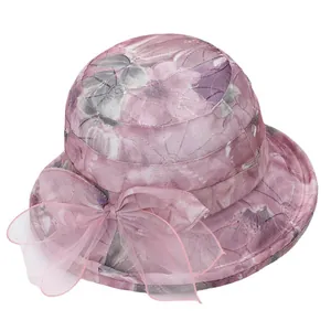 Women's breathable sun hat with wide brim, purple floral pattern and organza bow detail