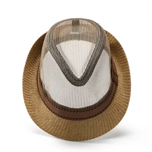 Detail of summer straw fedora hat featuring breathable mesh crown and woven brim for men