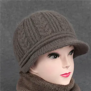 Warm winter knitted visor beanie for elderly women in brown rabbit hair blend texture.