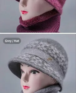 Detail of warm winter knit hat with neck warmer showing plush texture and bee ornament