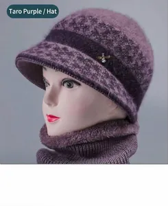 Detail of taro purple winter knit hat and scarf set with fleece lining and bee brooch