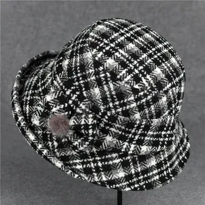 Classic black and white checkered wool cloche hat for elderly women with bow detail