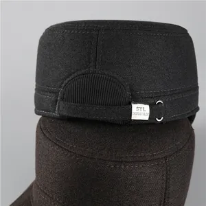 Detail of adjustable metal buckle and thick wool texture on men's warm flat caps