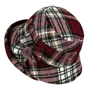 Classic plaid wool bucket hat for older women with a cozy bow and plush ball detail